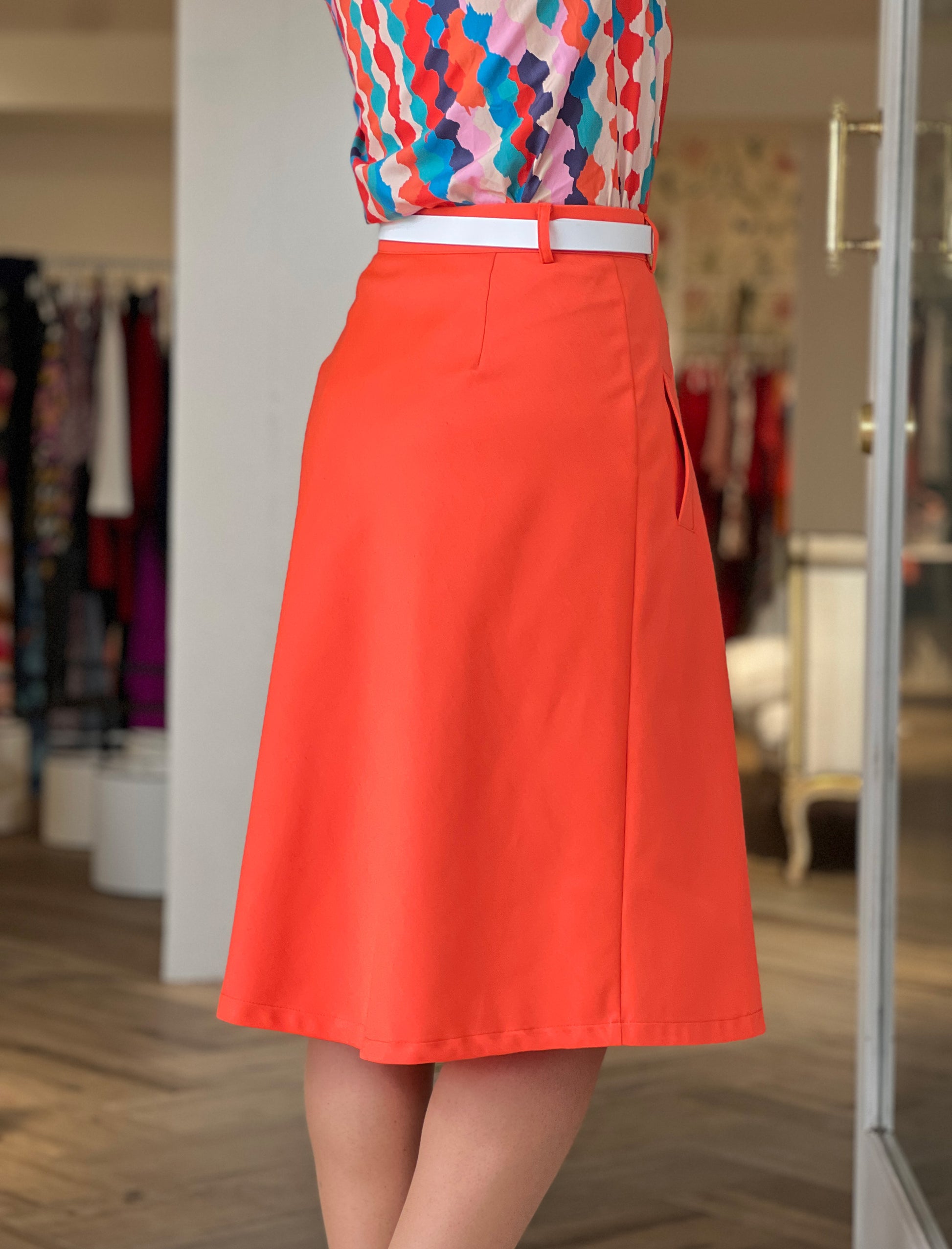 Falda trench midi Perfecta Coral Nuria Cobo