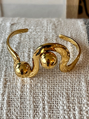 Brazalete curvas chic