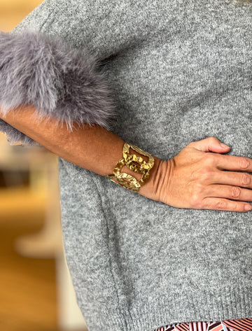 Brazalete trenzado dorado