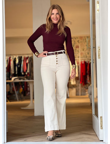 Jeans más bolsillos crema