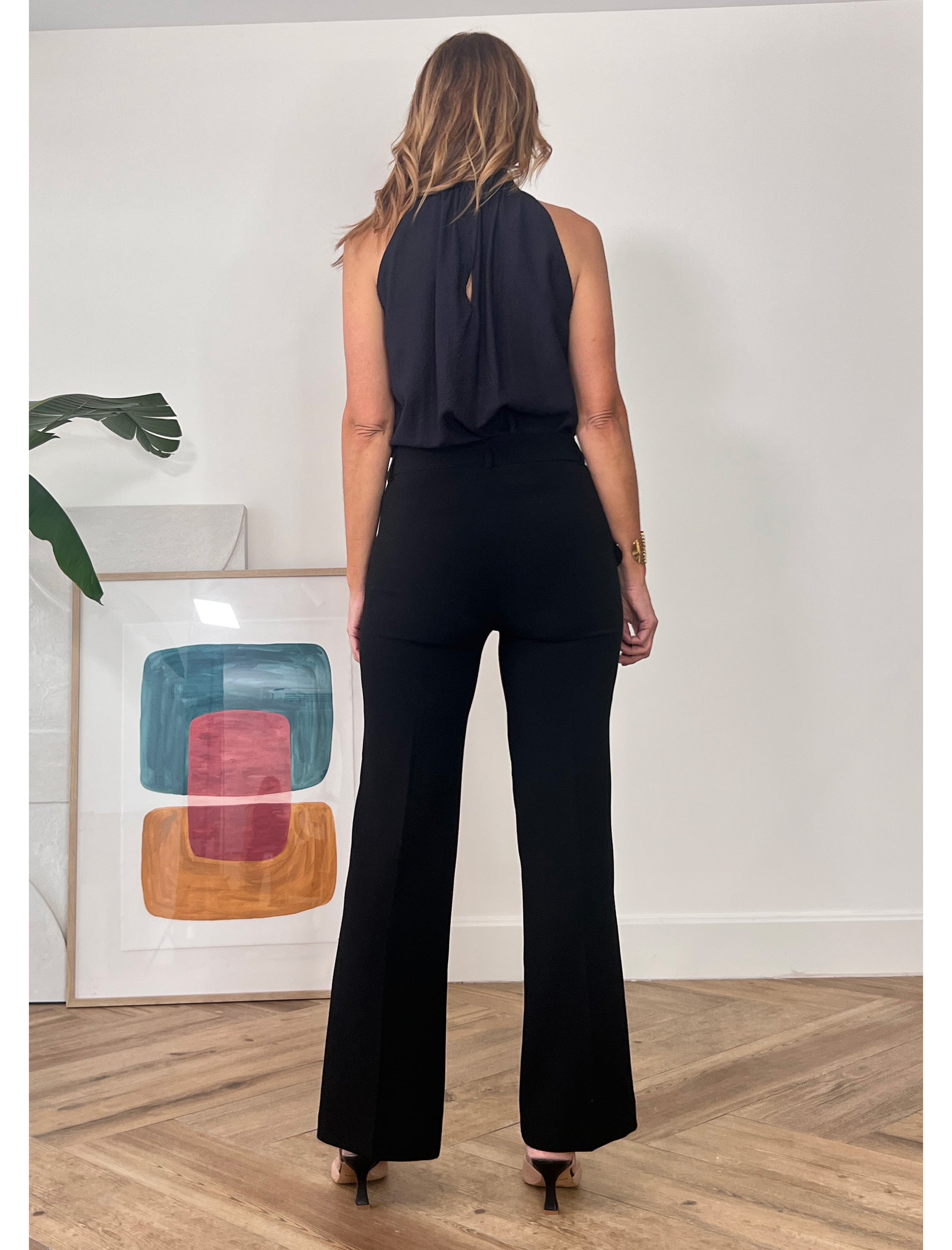 Pantalón ideal con botones blancos