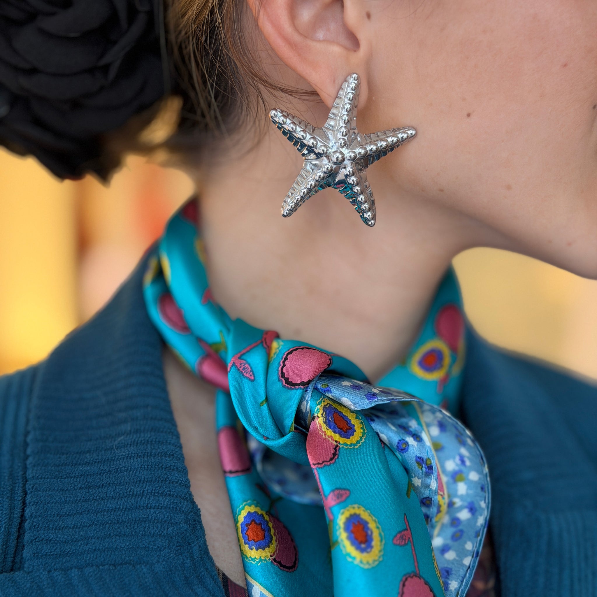 Pendientes estrella de mar plateada