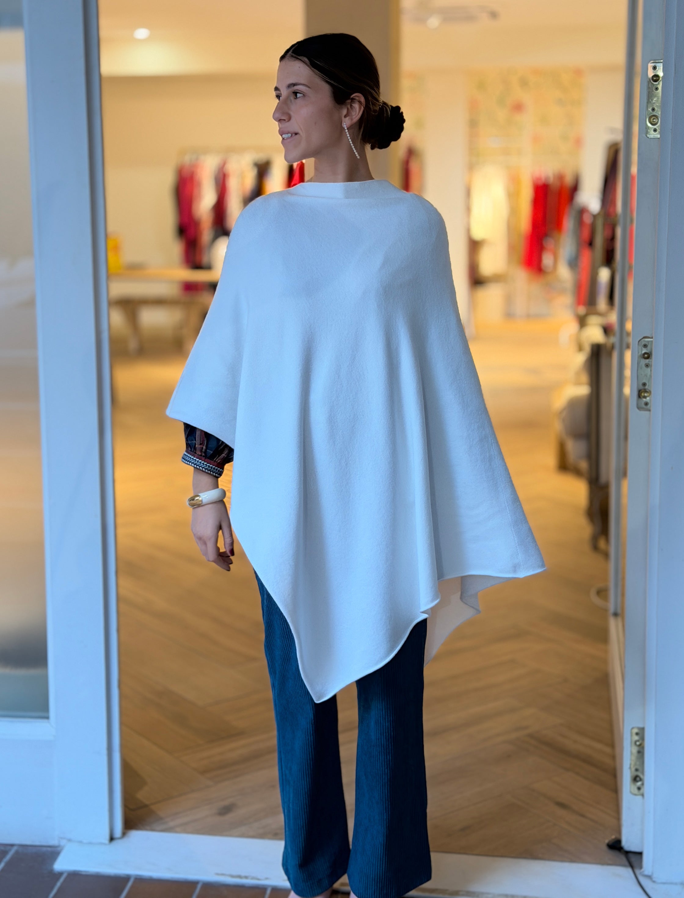 Capa de punto blanca