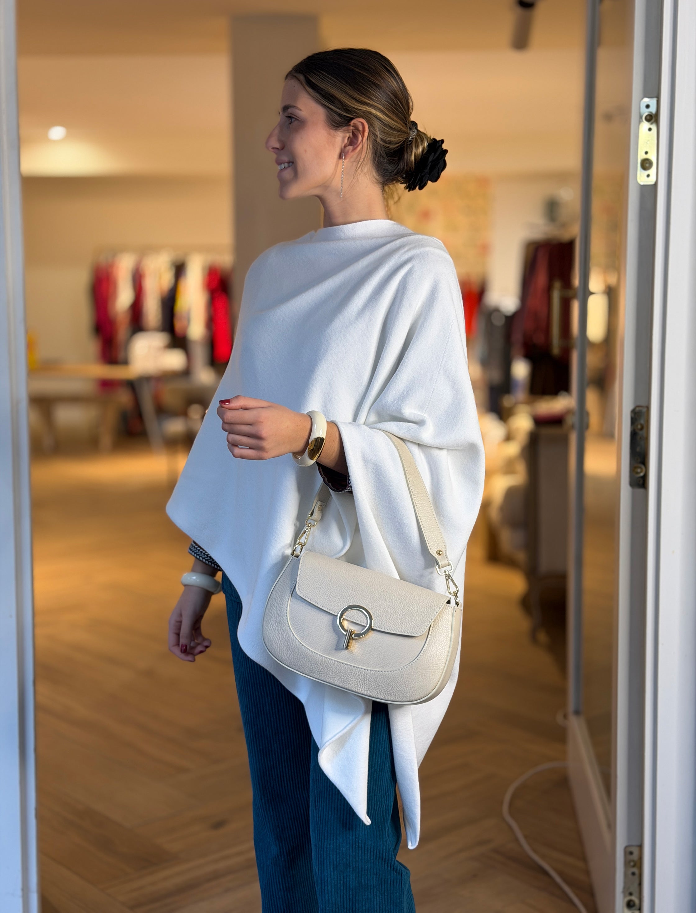 Capa de punto blanca