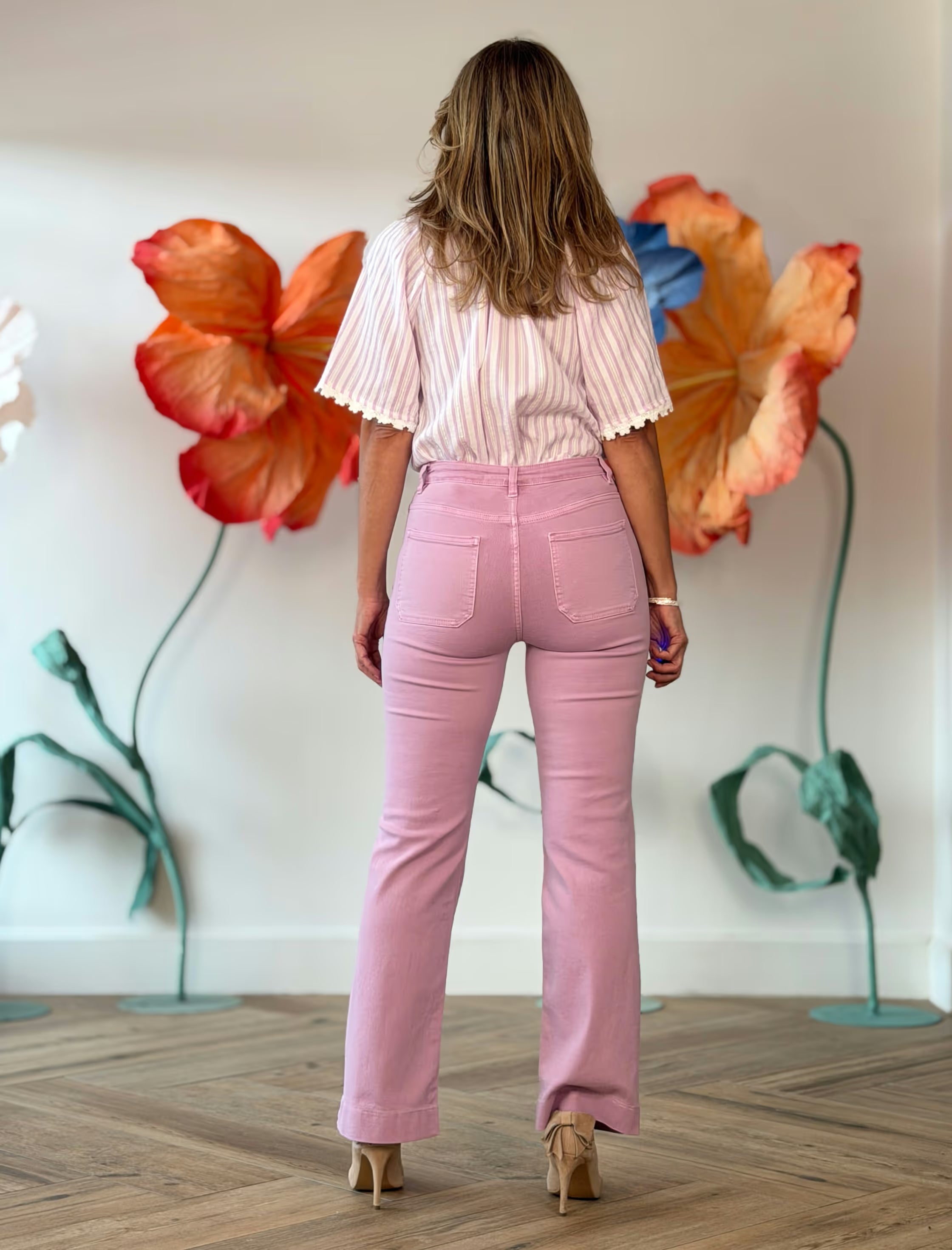 Pink denim pants with pockets