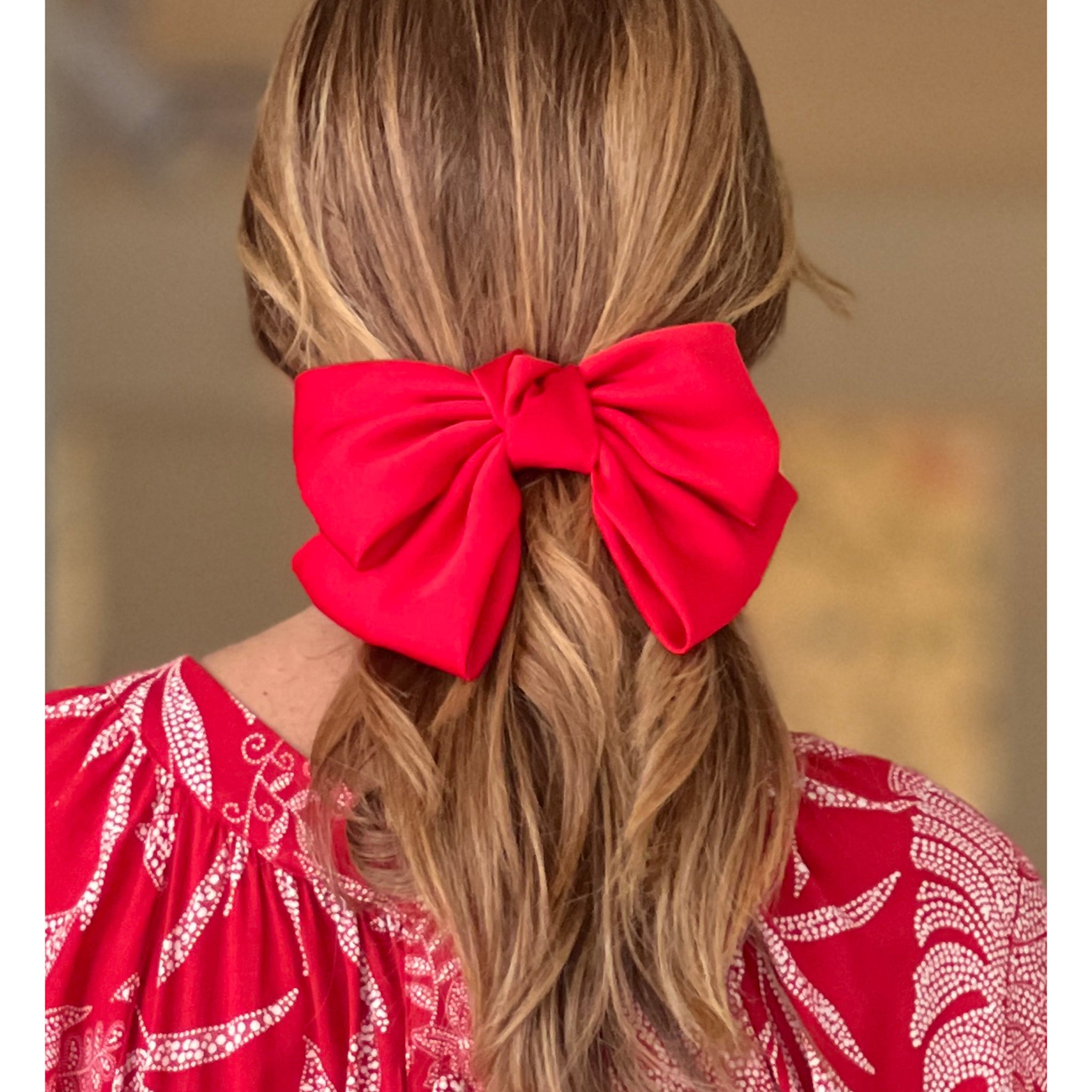 Pasador de pelo lazo rojo