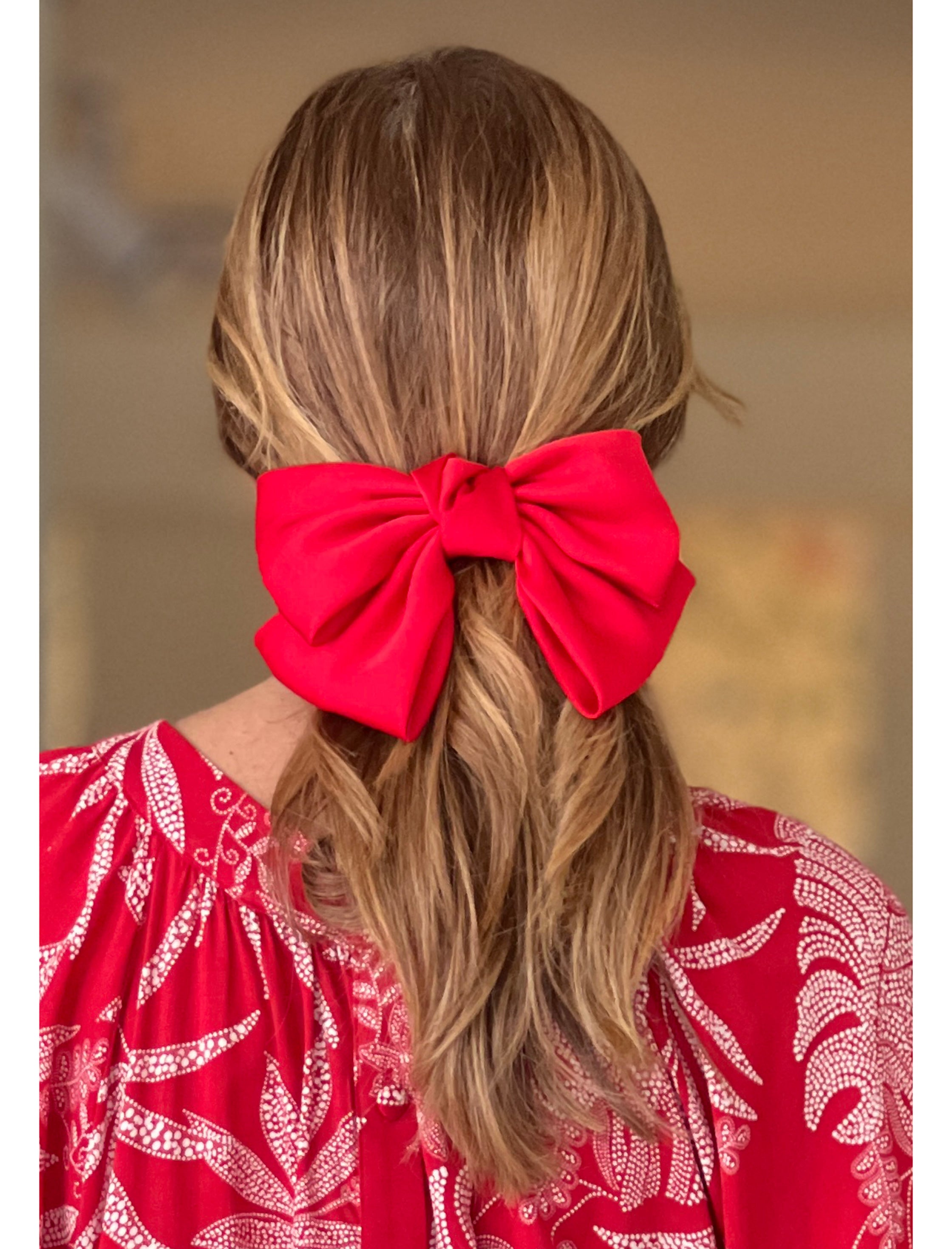 Pasador de pelo lazo rojo