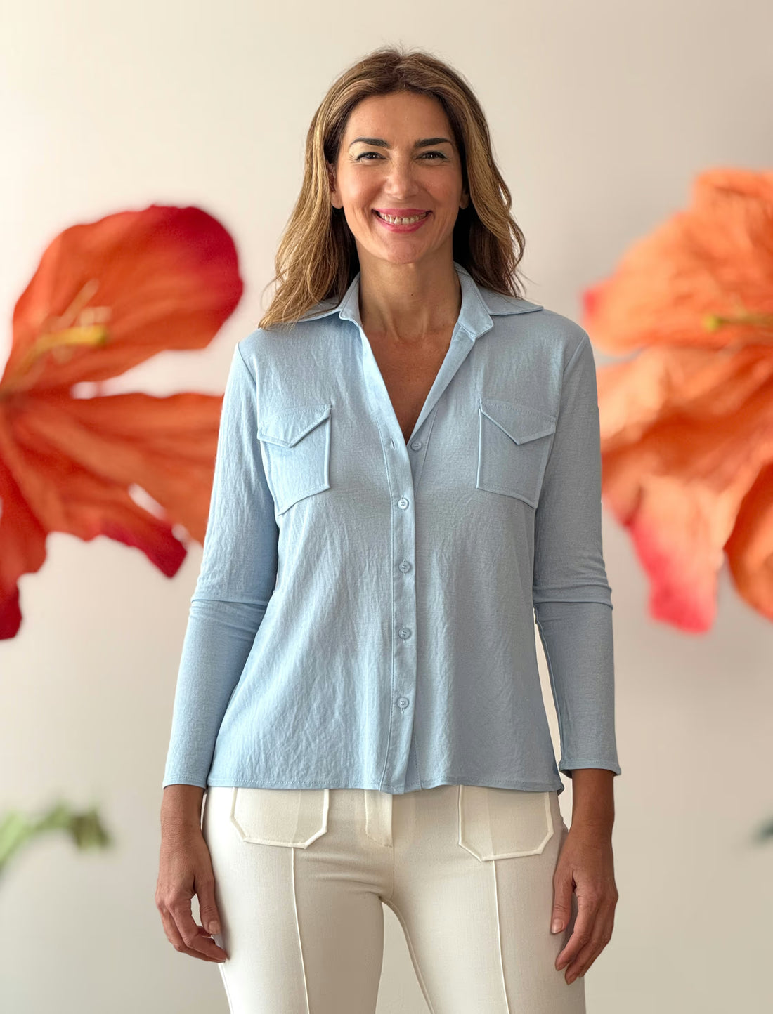 Camisa polo de bolsillos celeste