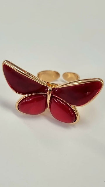anillo dorado de mariposa rojo